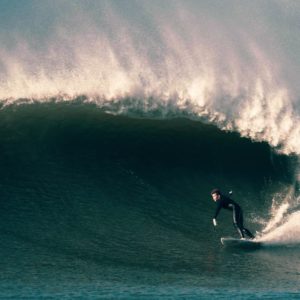 Croyde Bay surfer on a big wave