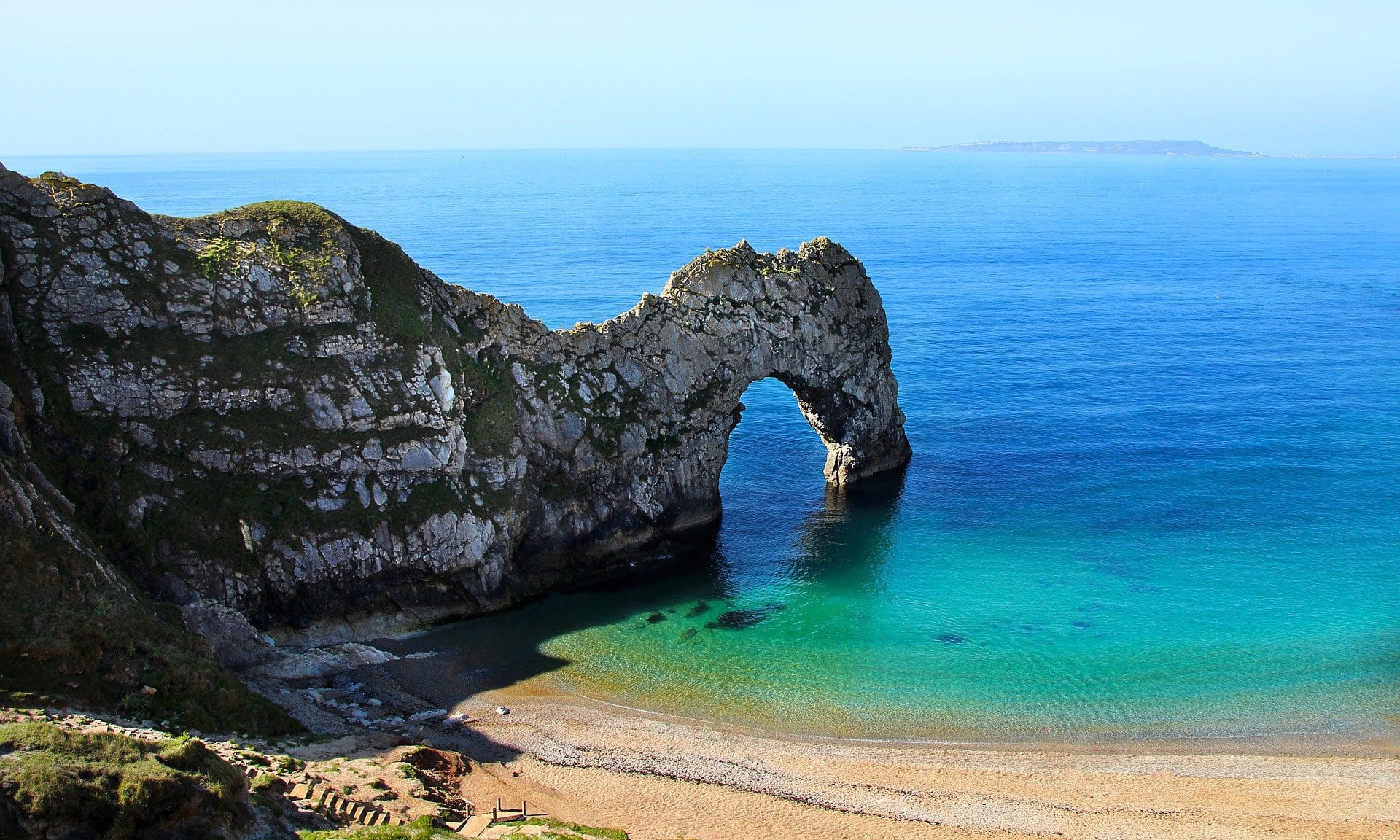 the south west coast path view of durdle door in dorset from the cliff top
