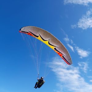 Paragliding in wales with a clear sky