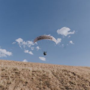 Paraglider just taken off from a hill