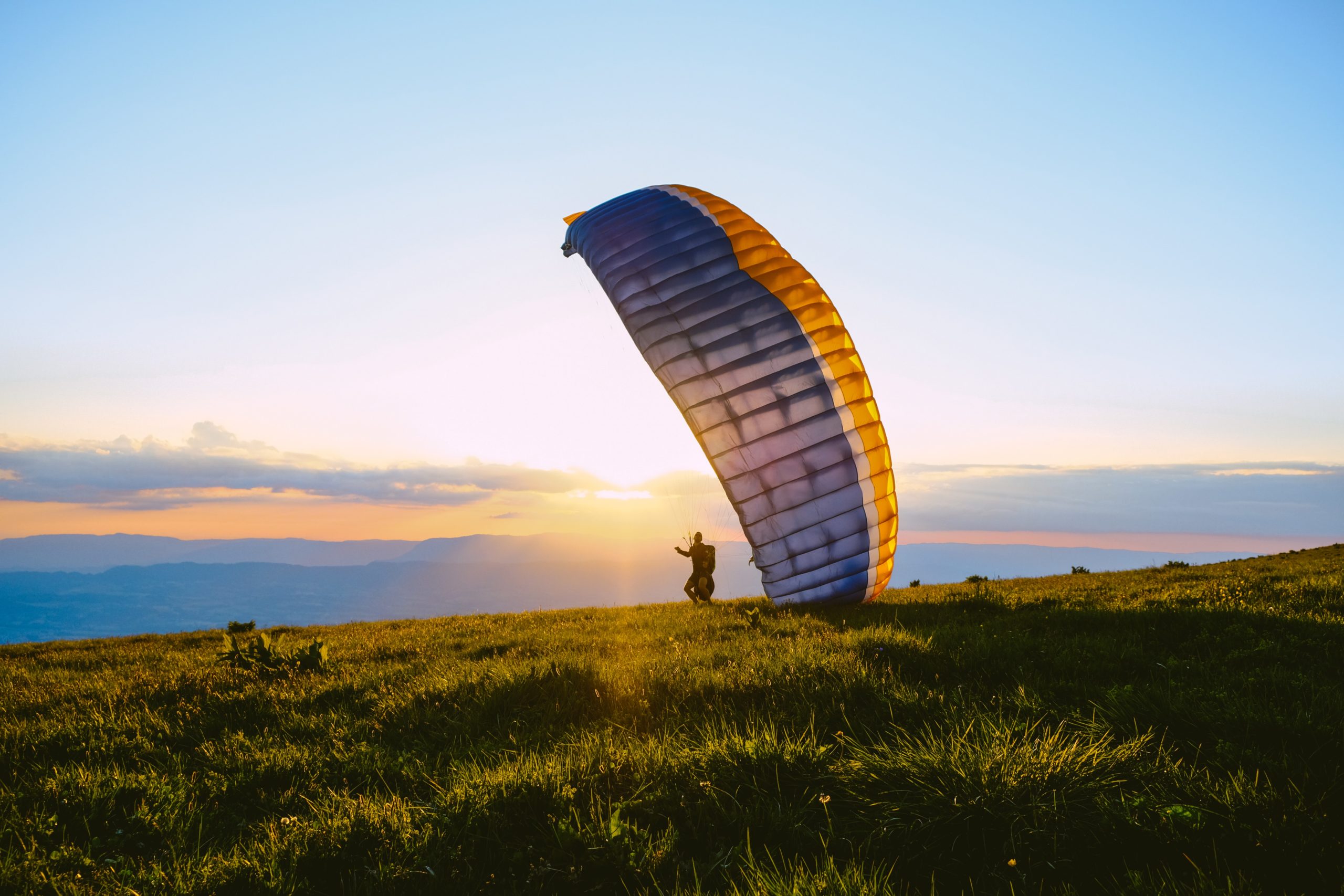 Paragliding in the sunset ready for take off
