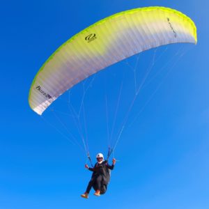 paragliding in the blue sky