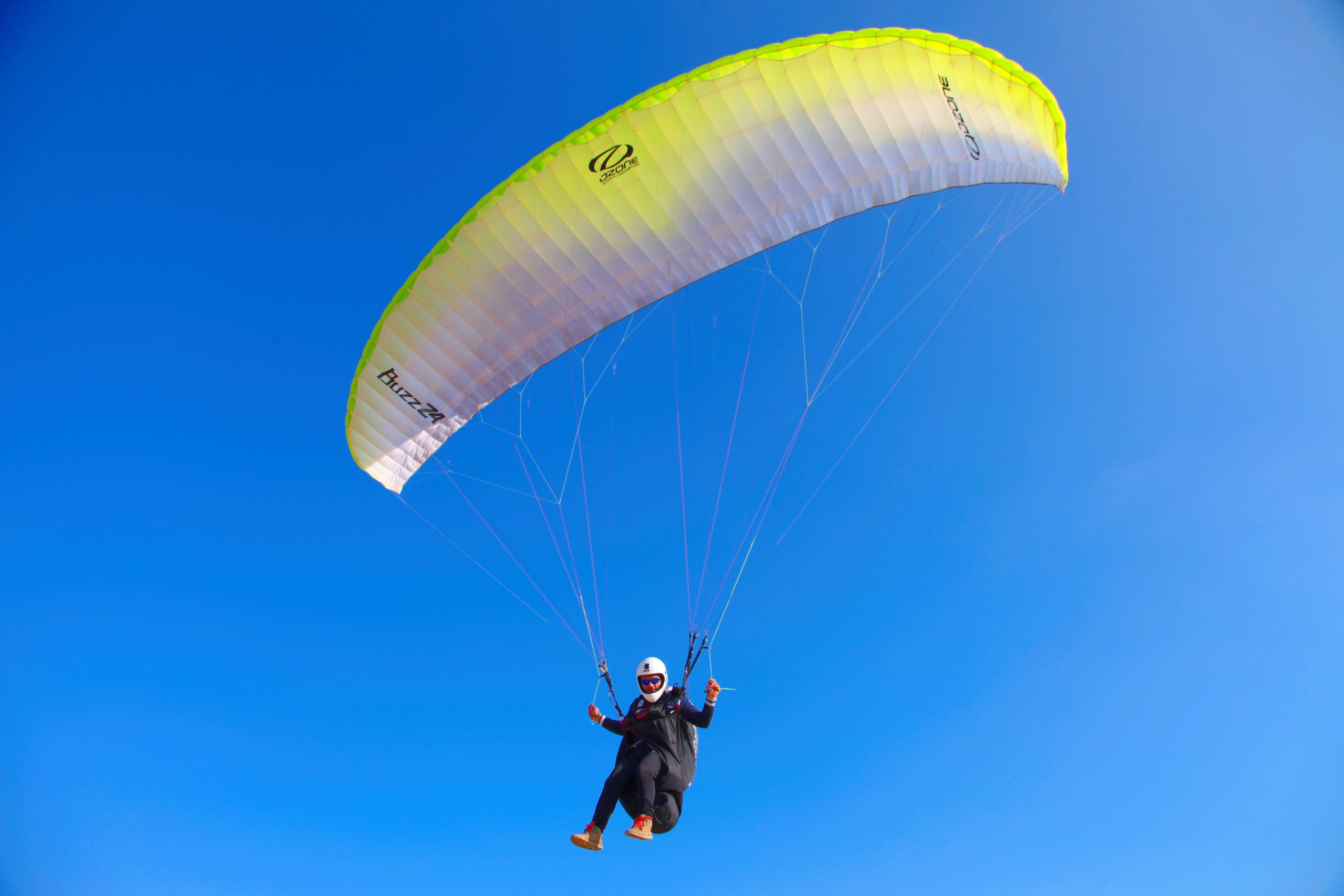 paragliding in the blue sky